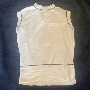 Sleeveless White Top with Black Trim